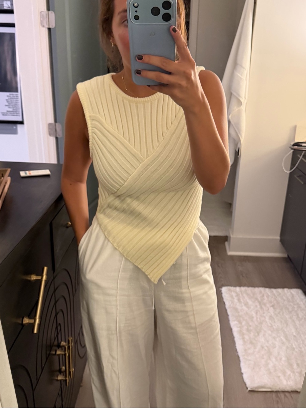 NET Sleeveless Ivory Ribbed Knit Handkerchief Hem Top